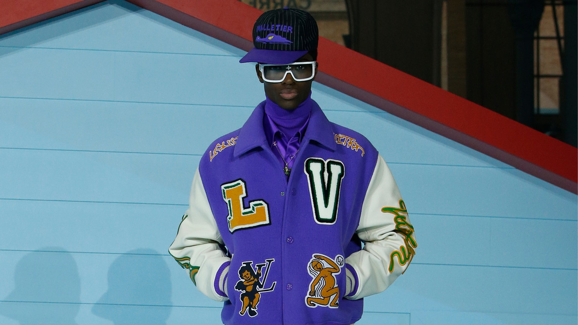 Virgil Abloh wears a Vuitton cap, a purple Gallery Dept. hoodie News  Photo - Getty Images